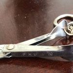 Vintage Hole Punch Keychain Photo 0