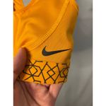 Nike Dri-FIT Medium Support Sports Bra Yellow Gold Geometric Band MED Photo 1