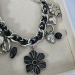 Silver and Black Charm Necklace Mixed Media Photo 3