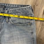 Levi's Women's Levi’s Size 4 Medium Boot Cut Light Blue Distressed Jeans Photo 4