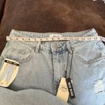 None Brand new denim distressed jorts so
Cool Photo 3