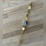 Citizen Eco-Drive Ladies Watch Crystals Pearl Dial Gold Tone Bracelet Solar Photo 5