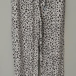 Olivaceous Black and White Leopard Print Joggers Photo 0