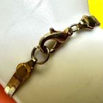 Gold tone flat herringbone bracelet Photo 5