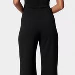 Bebe  Women's XL Black V-Neck Jumpsuit with Open Leg Slits Photo 4