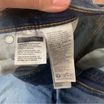 Levi's  size 29 Ribcage bell dark wash denim jeans raw hem flare retro Photo 3