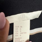 H&M Women Size 6 Striped short sleeve black Romper Photo 2