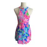 Lilly Pulitzer Gorgeous bright color floral dress, white crochet circles bodice, dress is fully lined, has pockets, hidden back zipper, excellent condition Measurements: Bust: armpit to armpit 16 inches Waist: side to side 14 inches Length: shoulder seam to bottom Photo 2