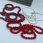 3 “oops a daisy” vintage metal enamel beaded necklaces. White Photo 0