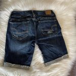 American Eagle Shorts Womens 2 Midi Denim Low Rise Distressed Stretch Cuffed Hem size 00 Photo 1