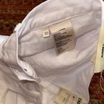 L'Agence NWT L’AGENCE PARIS MID RISE AUDREY WHITE CUT OFF DENIM SHORTS Photo 3