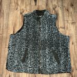 Maurice's fuzzy vest Photo 0