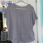 Out From Under Shirt Photo 0