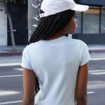 Brandy Melville John Galt Light Blue Tee Shirt Photo 1