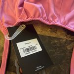 Cherokee Tooniforms Disney Love happens unisex scrub hat Photo 9