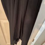 Coco Bianco  sleeveless, black sheath dress with gold chain detail Photo 8