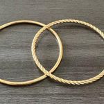 Two Gold Bangle Bracelets Photo 0