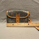 Dooney & Bourke  Signature Wristlet Clutch Bag Canvas Leather Trim Snap Photo 1