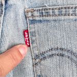 Levi's Levi’s Women’s Mid Length Mid Rise Light‎ Wash Distressed Denim Shorts Size 27 Photo 5