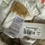 Francesca’s NWT Cream lace pleated lace mini skirt with satin waist, size small Tan Photo 4