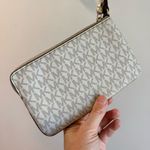 Michael Kors Jet Set Wristlet in Vanilla Signature Logo Print Photo 3