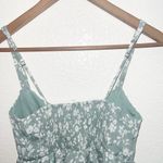 E & M  Juniors Green Floral Babydoll Smocked Back Adjustable Strap Tank Top Photo 7