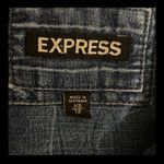 EXPRESS Rugged Denim button down blouse - Size XS. ***Refer to measurements. Great as is or wear as a jacket. Gently warn and excellent condition in it’s original rugged wear with rough patches- refer to pictures. Measurements: armpit to armpit: 20” x 21” long. None smoking home. Priced to sell at as is condition. Don’t like my price, make reasonable offer. Photo 4