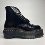 Dr. Martens  Sinclair Distressed Patent Leather Platform Boots in Black Photo 1