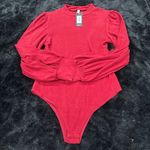 Glam Boutique brand new body suit  Photo 1