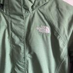 The North Face Green rain jacket key with hood and bill size xs Photo 1