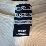 Broken Promises Crop Photo 1