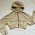 Urban Outfitters β
UO Yogi Fleece Cropped Zip-Up Hoodie Sweatshirt - Beige β
Photo 1