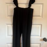 Miss V NWOT Elegant Black Ruffle Strap Jumpsuit Size M Photo 0