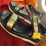 ALDO  size 6.5 Gold and Black Sandals with Chunky Sole Photo 3