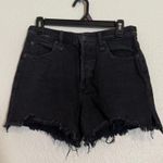 Free People  We the Free mid rise black distressed denim jean shorts size 26 Photo 0