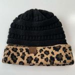 C.C. Beanie Hat Stretch Cable Knit Ribbed Super Soft Animal Print Messy Bun Black Photo 0