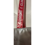 Clinique  Women's Silver Tote Bag Peppermint Swirl Pattern Inside Tote Red Handle Photo 5