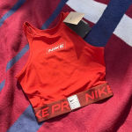 Nike NWT Pro Dri-FIT Graphic Crop Tank burnt orange cropped workout top
XS Photo 0