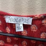 Patrons of Peace Red Patterned Sleeveless Top Photo 1