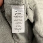 Susana Monaco Plunge V Neck Sleeveless Ruffle Hem Mini Dress in Fog Grey Photo 4