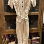 Main Strip  tan linen romper pantsuit Photo 0
