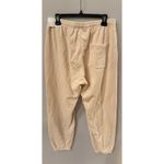Sporty & Rich Fitness World Cream Track Pants Photo 3