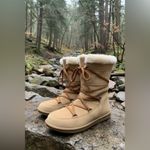 Skechers  suede snow boots with a faux fur trim and wraparound laces. 8US Photo 1