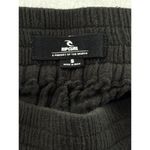 Women’s Rip Curl Ribbed Flare Pants – Black – Size S Photo 1