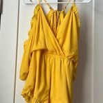 GB  Yellow Romper with Open Back Tassels and Ruffles Photo 0