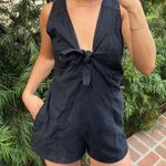 Free People  Black mini romper with tie front and pockets sz M Photo 1