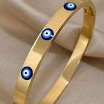 • Gold evil eye hinge clasp stainless steel bracelet Photo 0