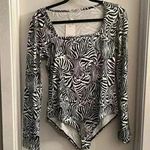 MANGOPOP Bodysuit Photo 0