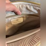 Nanette Lepore Tan Woven Bag with Gold Chain
White leather accents stripe lining Photo 10