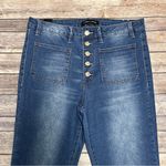 Almost Famous Medium Wash High Rise Button Fly Patch Pockets Flare Jeans Juniors Photo 1